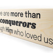 Load image into Gallery viewer, We Are More Than Conquerors Wood Decor